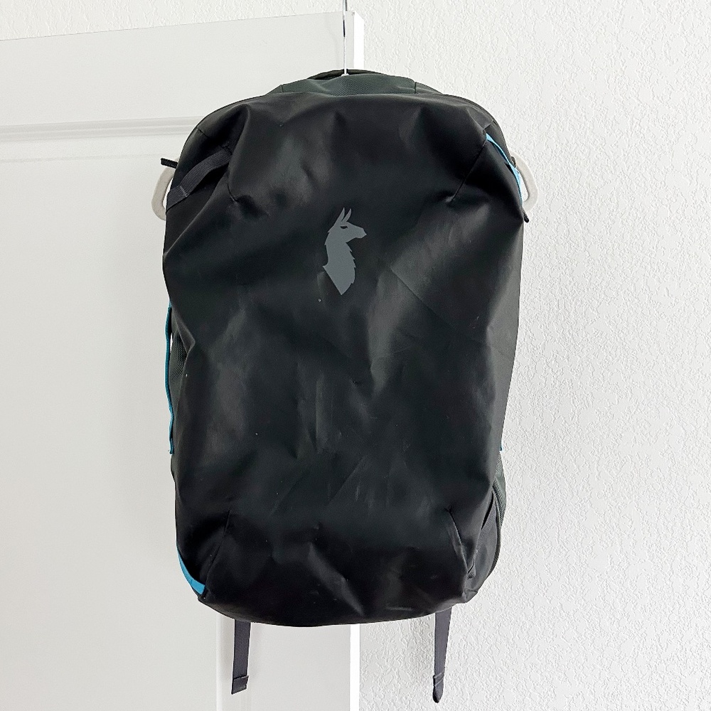 Cotopaxi Allpa 35L Travel Pack Black with blue stripe